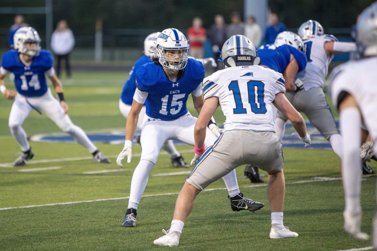 Josh DiBlasio (No. 15) prepares for a block after Johnny DiBlasio (No. 14) hands the ball off (photo courtesy of the DiBlasio family)